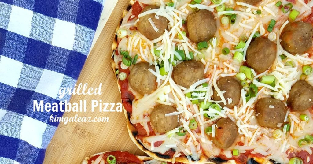 Kid-friendly meatball pizza on the grill for family dinners, picnics and cookouts.
